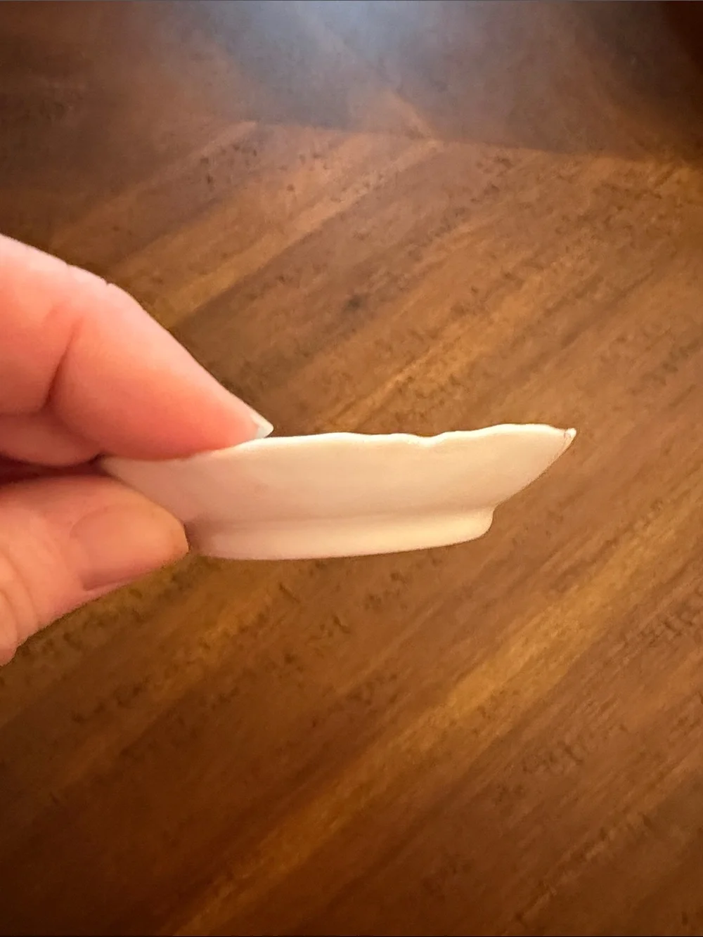 Haviland Limoges butter pat 3” with a beautiful scalloped edge